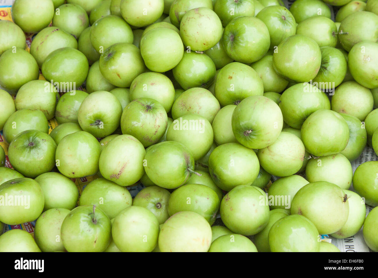 A lot of star apples, at a market in Phu Quoc, Vietnam Stock Photo