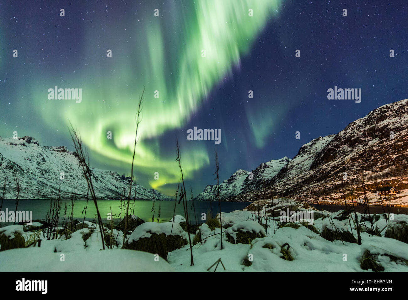 Aurora Borealis (Northern lights) above a coastal beach in Norway, Tromso Stock Photo