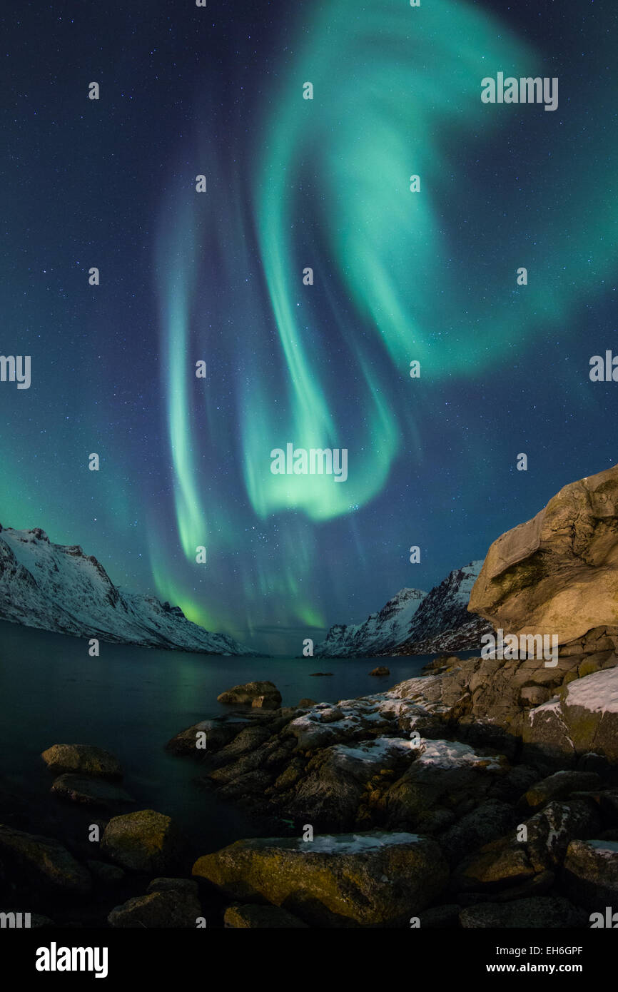 Aurora Borealis (Northern lights) above a coastal beach in Norway, Tromso Stock Photo