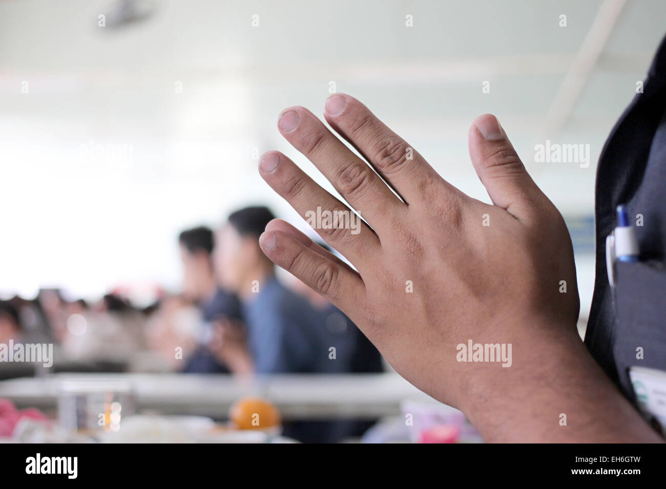 Hand is to pay homage on the philanthropy. Stock Photo