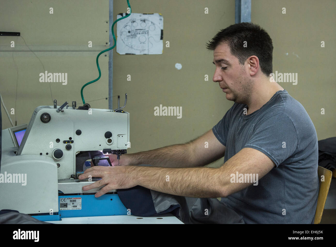 Male Worker Sewing, Astibo Garment Factory, Štip Stock Photo