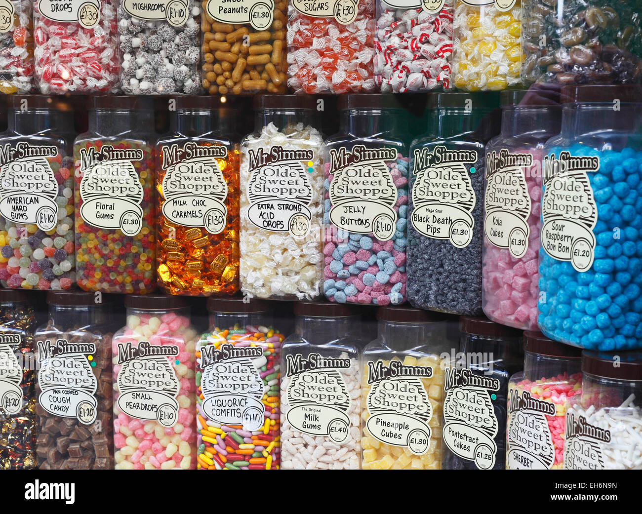 Jars of sweets on display in a traditional style sweet shop Stock Photo