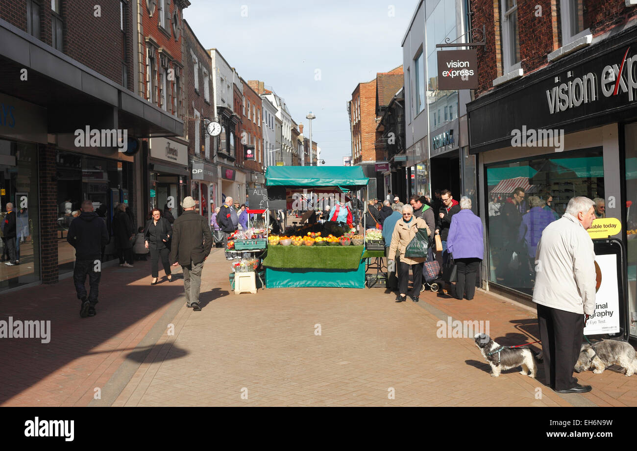 High street shopping in King's Lynn, Norfolk with a fruit and veg