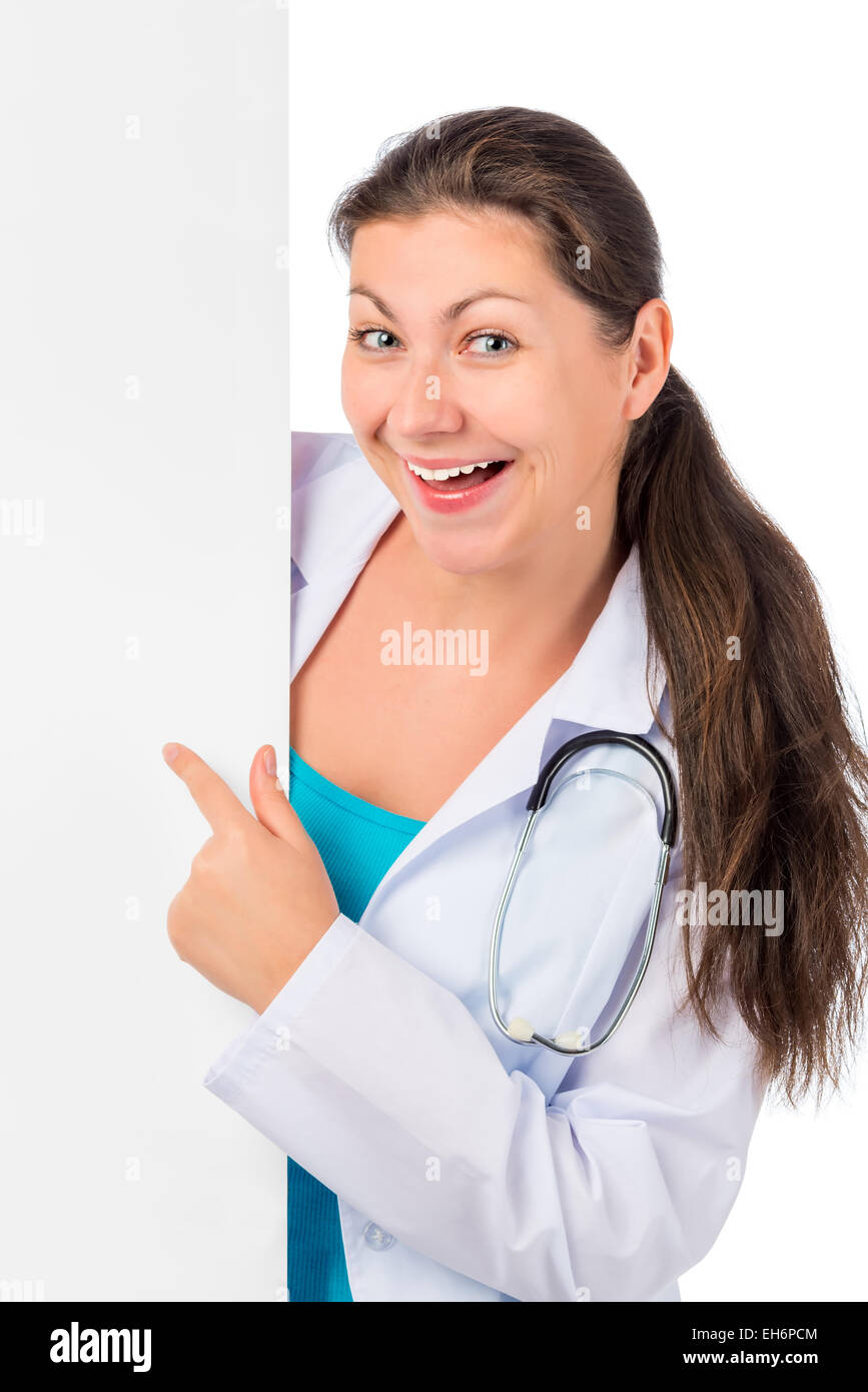 Vertical shot cheerful doctor with a blank for inscriptions Stock Photo