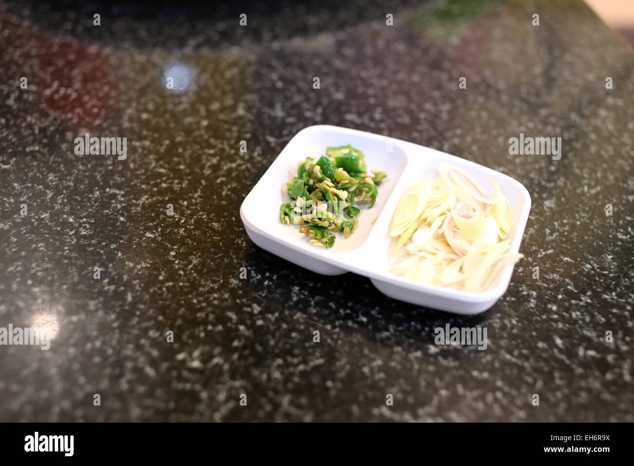 Pepper and crushed garlic in a restaurant Stock Photo Alamy