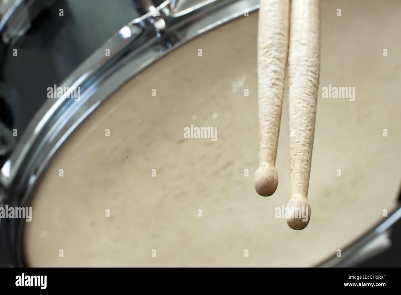 drumsticks and old and very often used drum Stock Photo Alamy