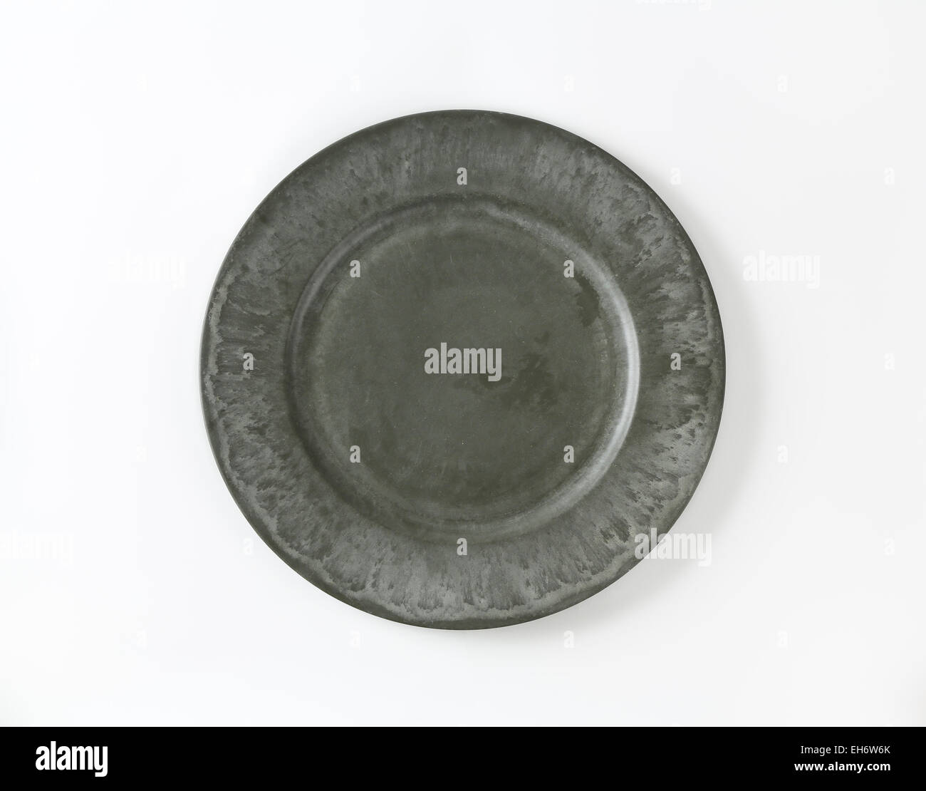 Wide rimmed gray dinner plate Stock Photo Alamy