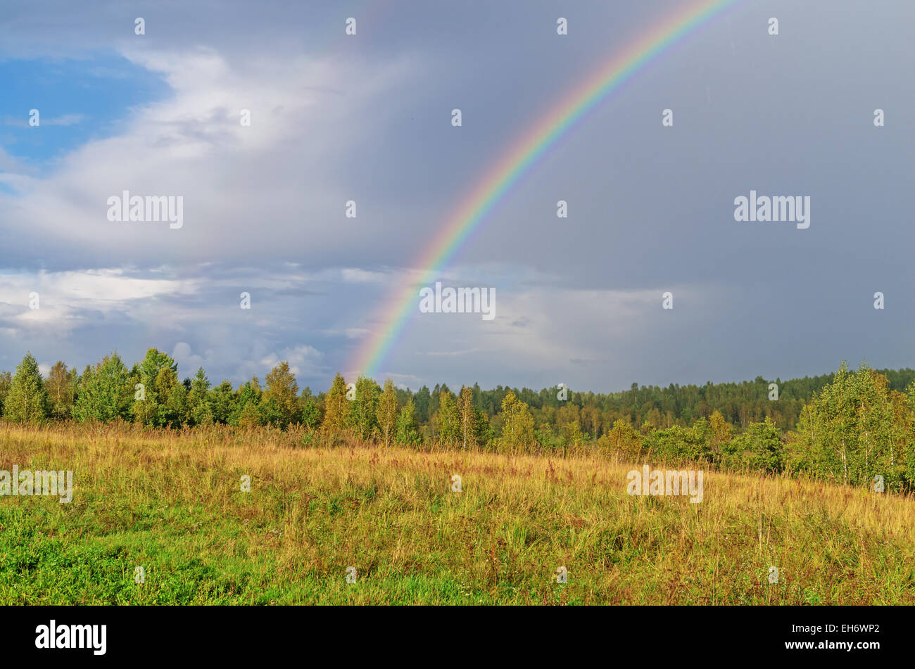 Village rainbow landscape Stock Photo - Alamy