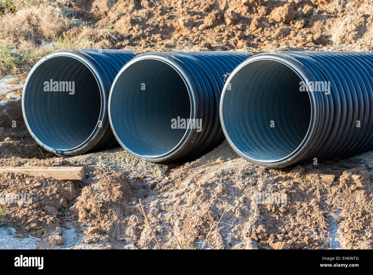 drain pipes buried under ground Stock Photo