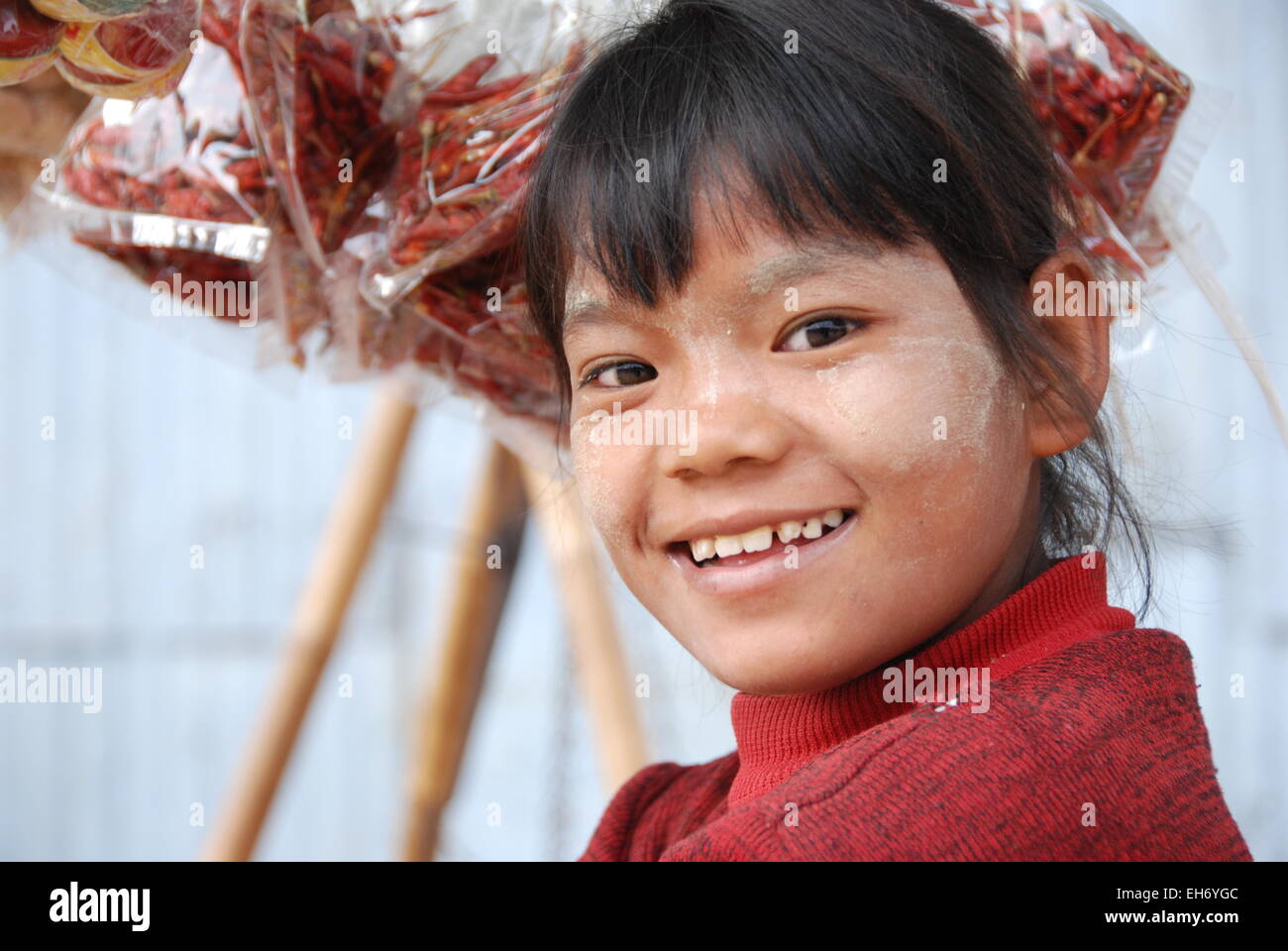 Girl smiling, Kengtung Market Stock Photo