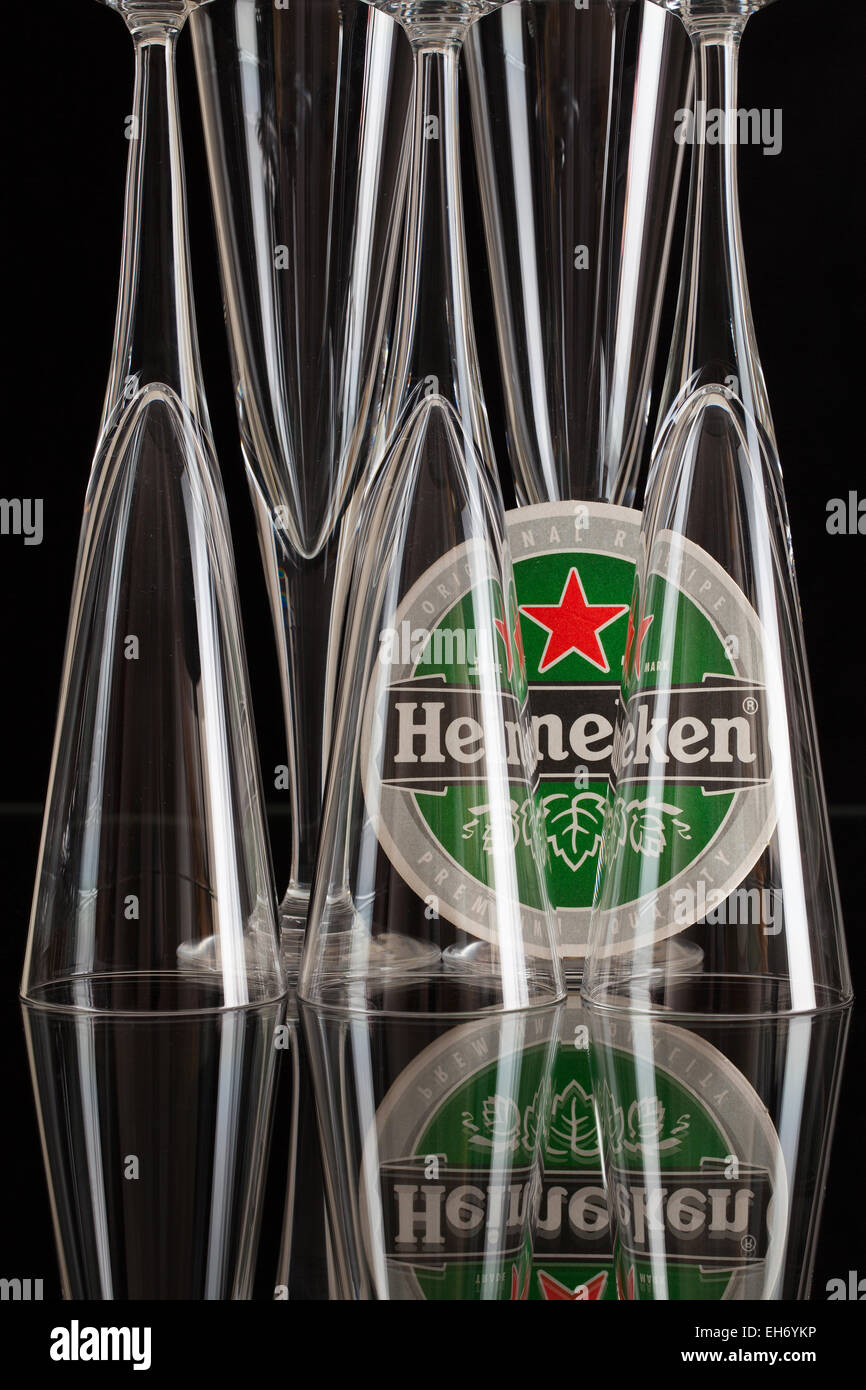 Czech Republic, Brno - January 5,2015:Beermat from Heineken beer and three glasses.Heineken Lager Beer, Stock Photo