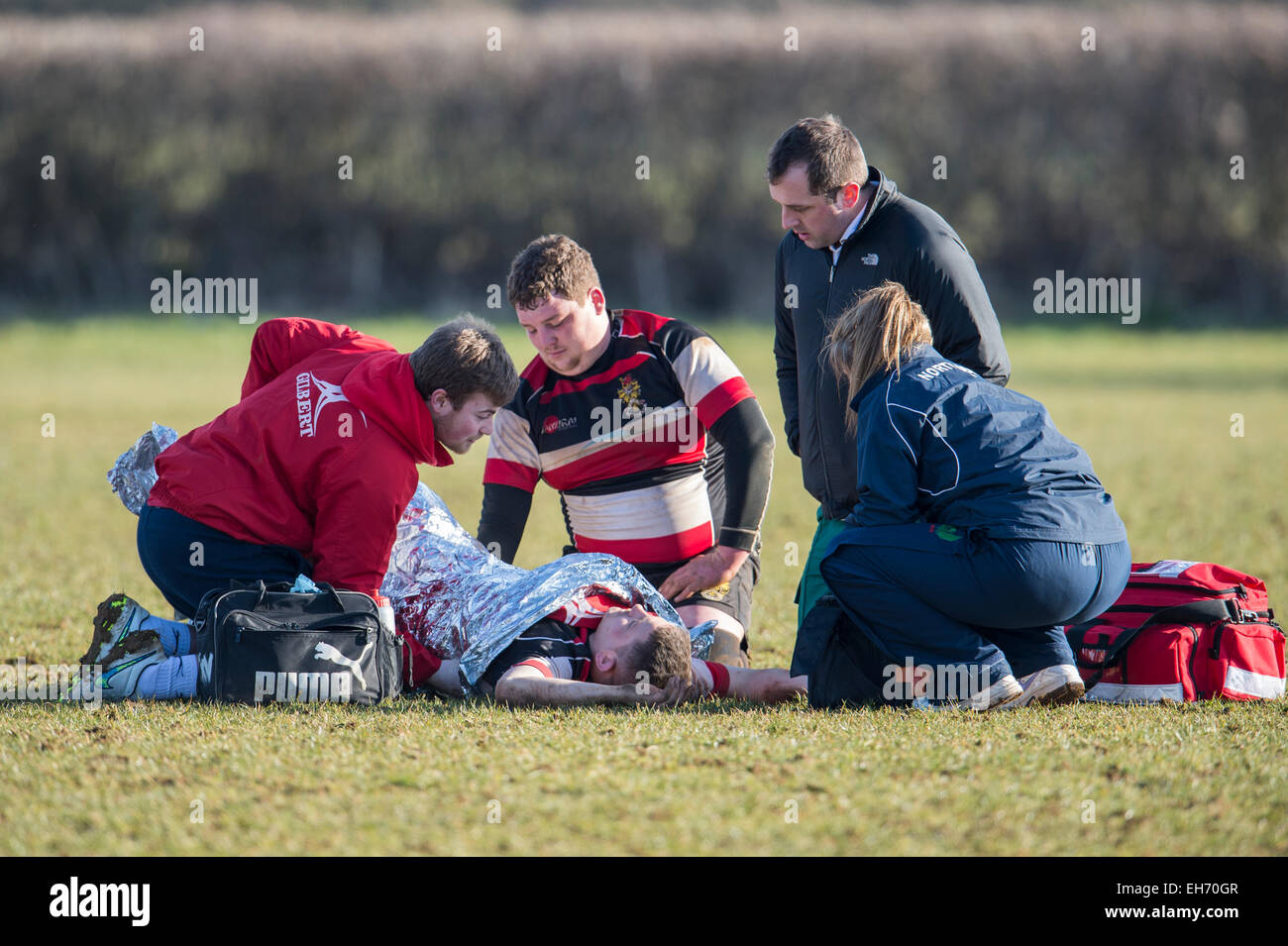 Rugby player injured, requiring ambulance - Dorset - England. Stock Photo