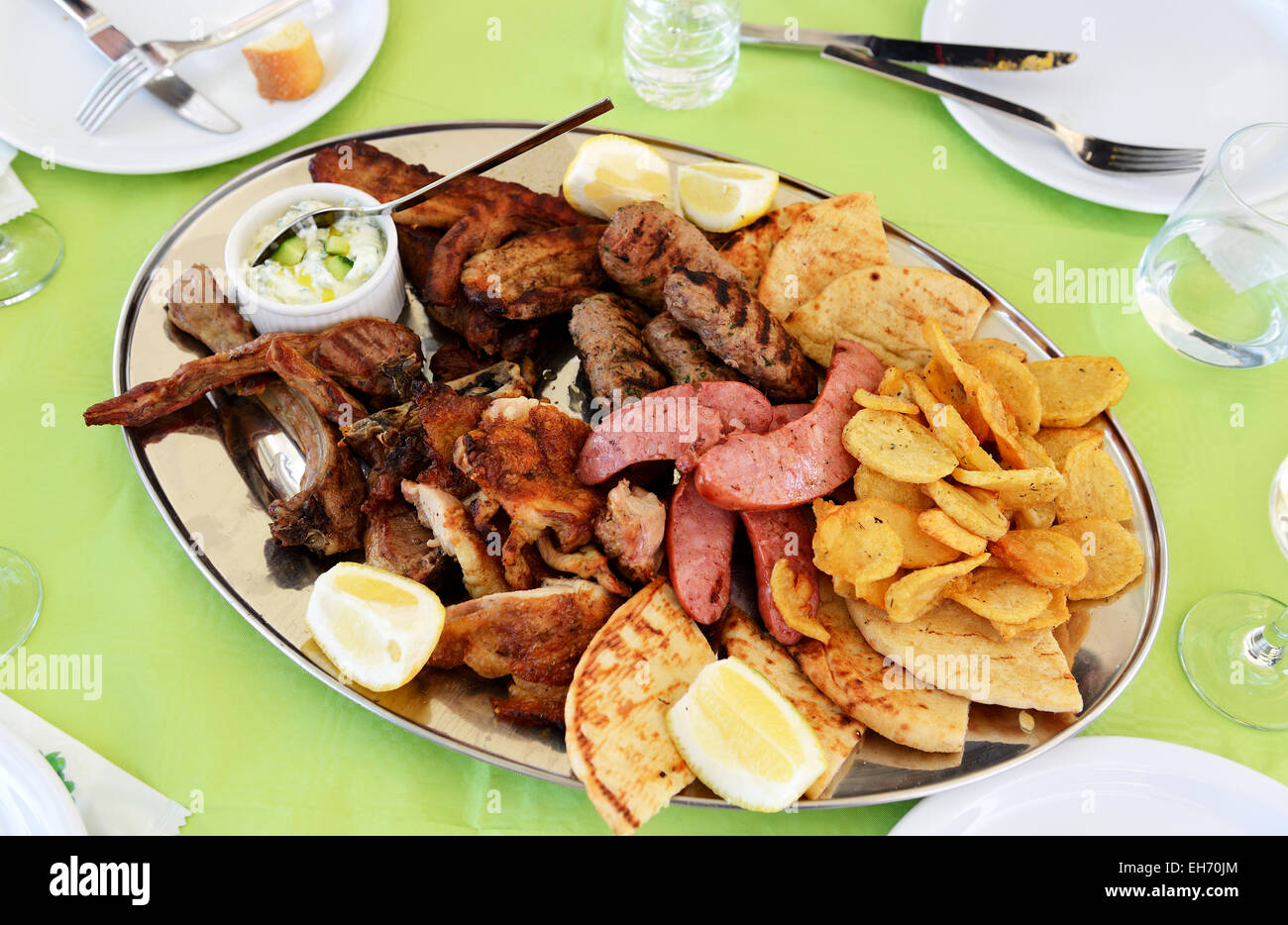 Traditional food in the restaurant on Santorini island, Greece Stock Photo