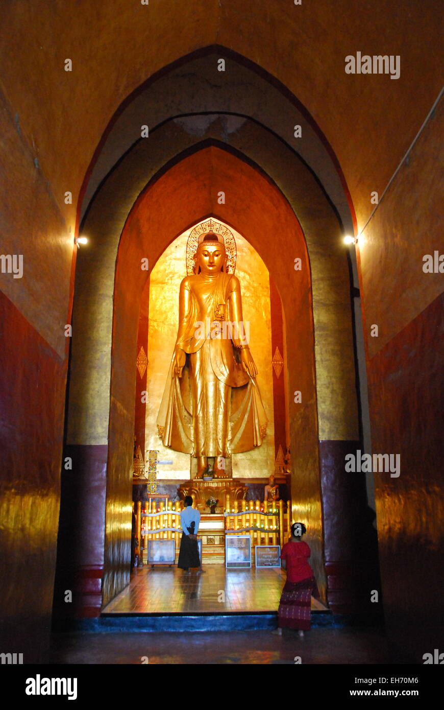 Buddha statue inside Ananda Temple, Bagan Stock Photo