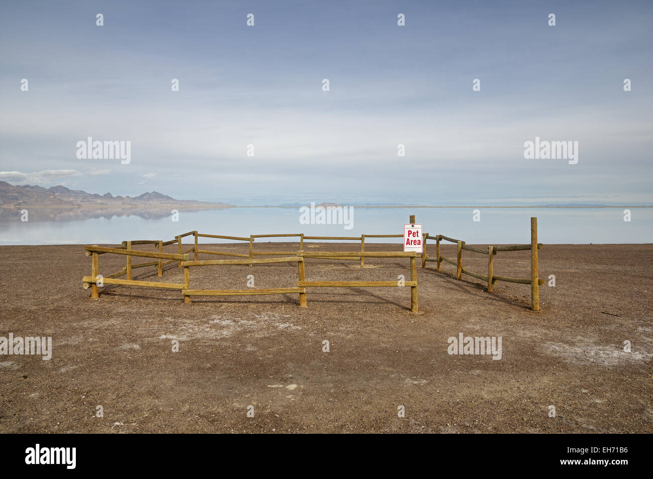 small fenced off gravel pet area near the flooded Bonneville Salt Flats Stock Photo