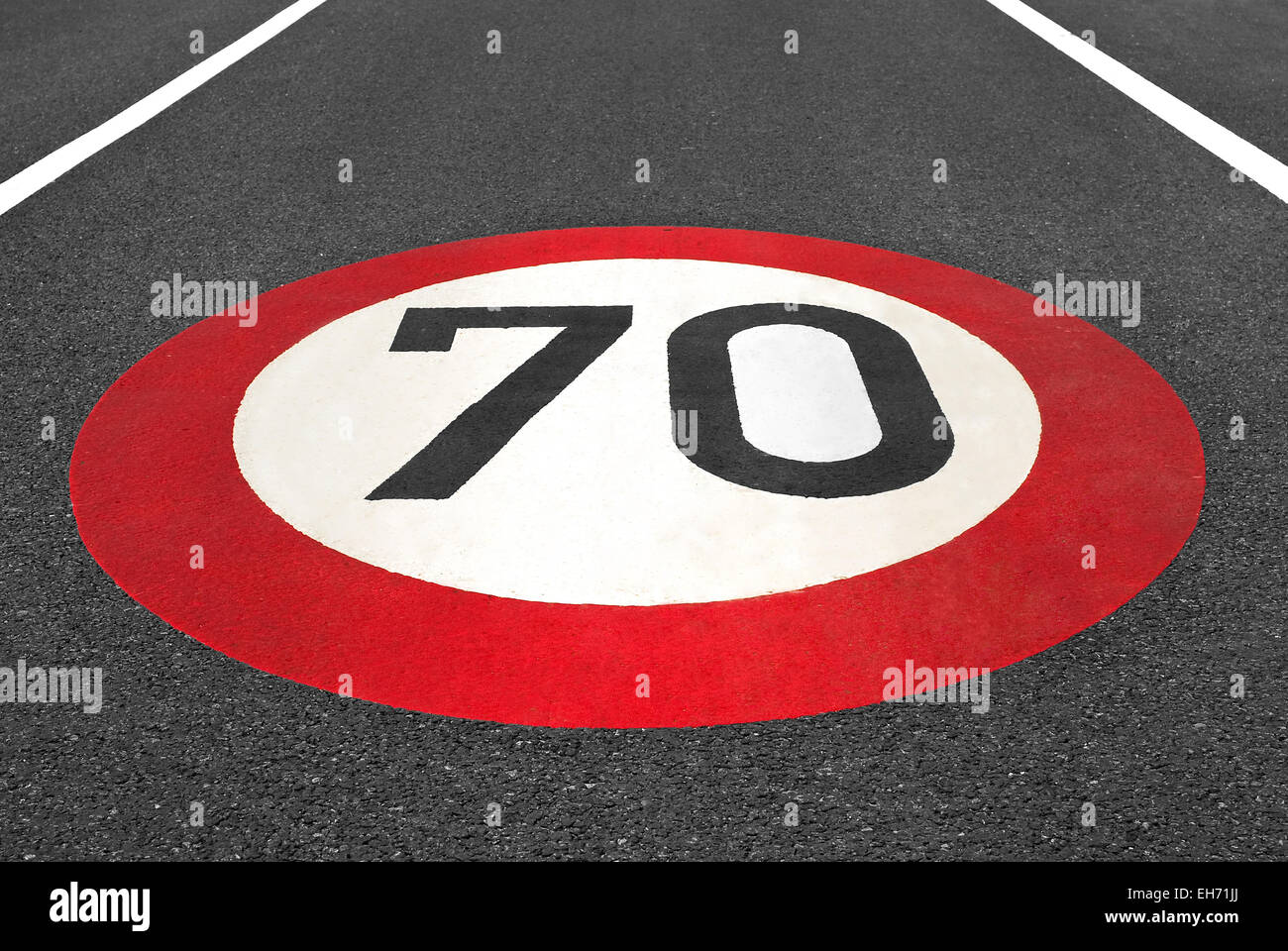 speed limit sign painted on road Stock Photo