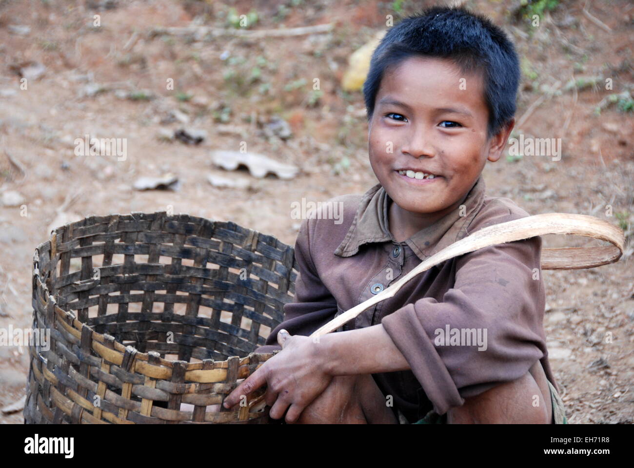 Chin tribal boy with basket, Kanpetlet Chin village Stock Photo Alamy