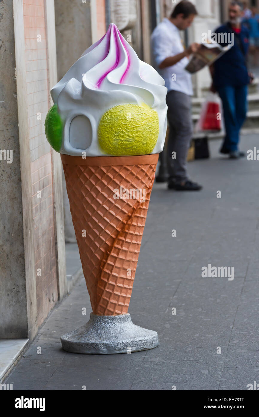 A big ice cream cone banner on display outside a Gelateria, Rome, Italy Stock Photo
