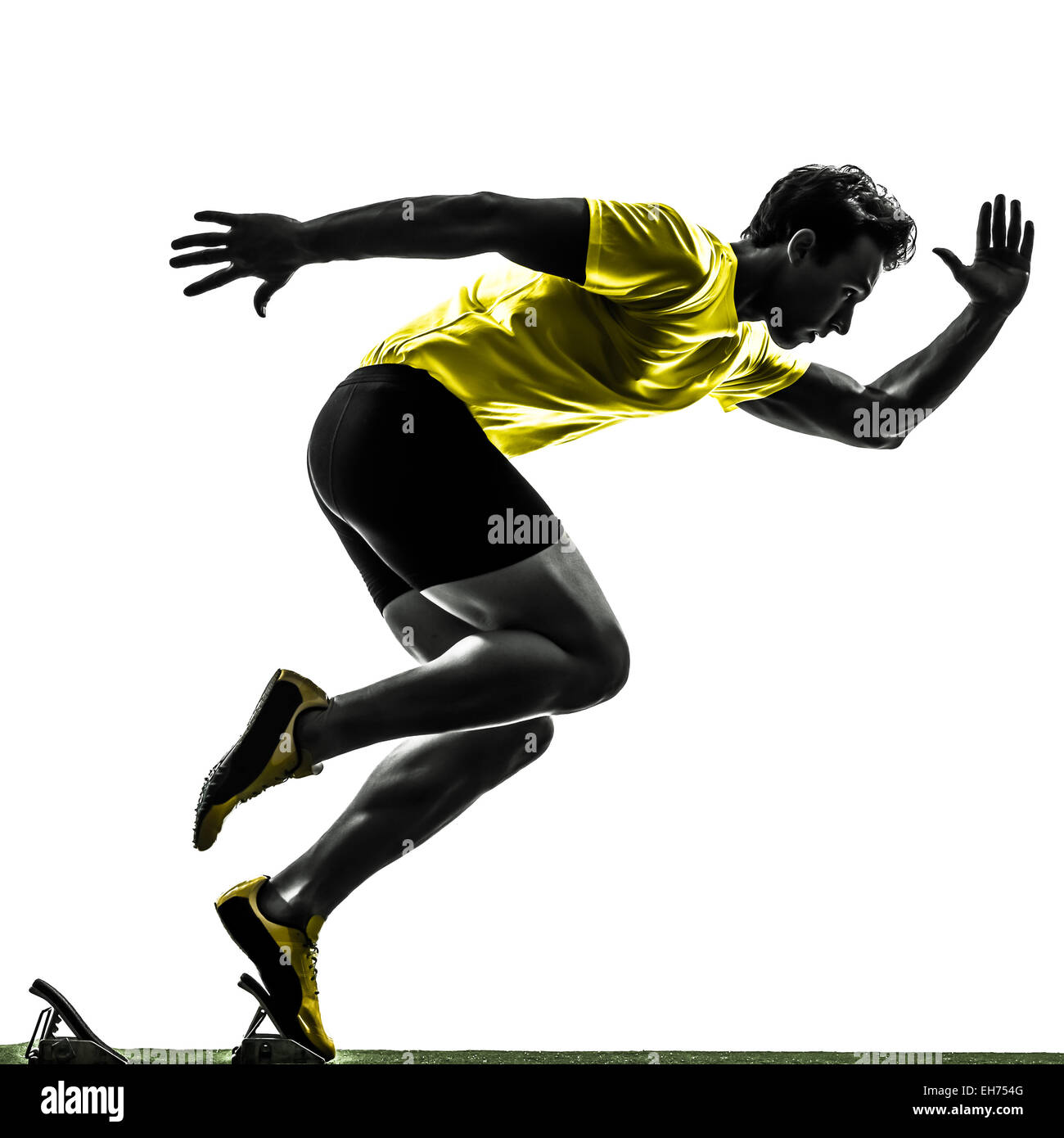 one man young sprinter runner in starting blocks silhouette studio on