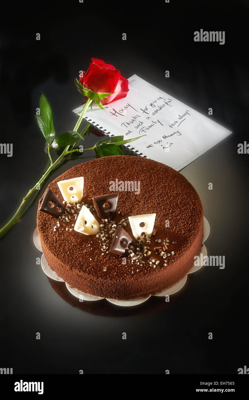 Mother Day Cake with rose on dark background Stock Photo