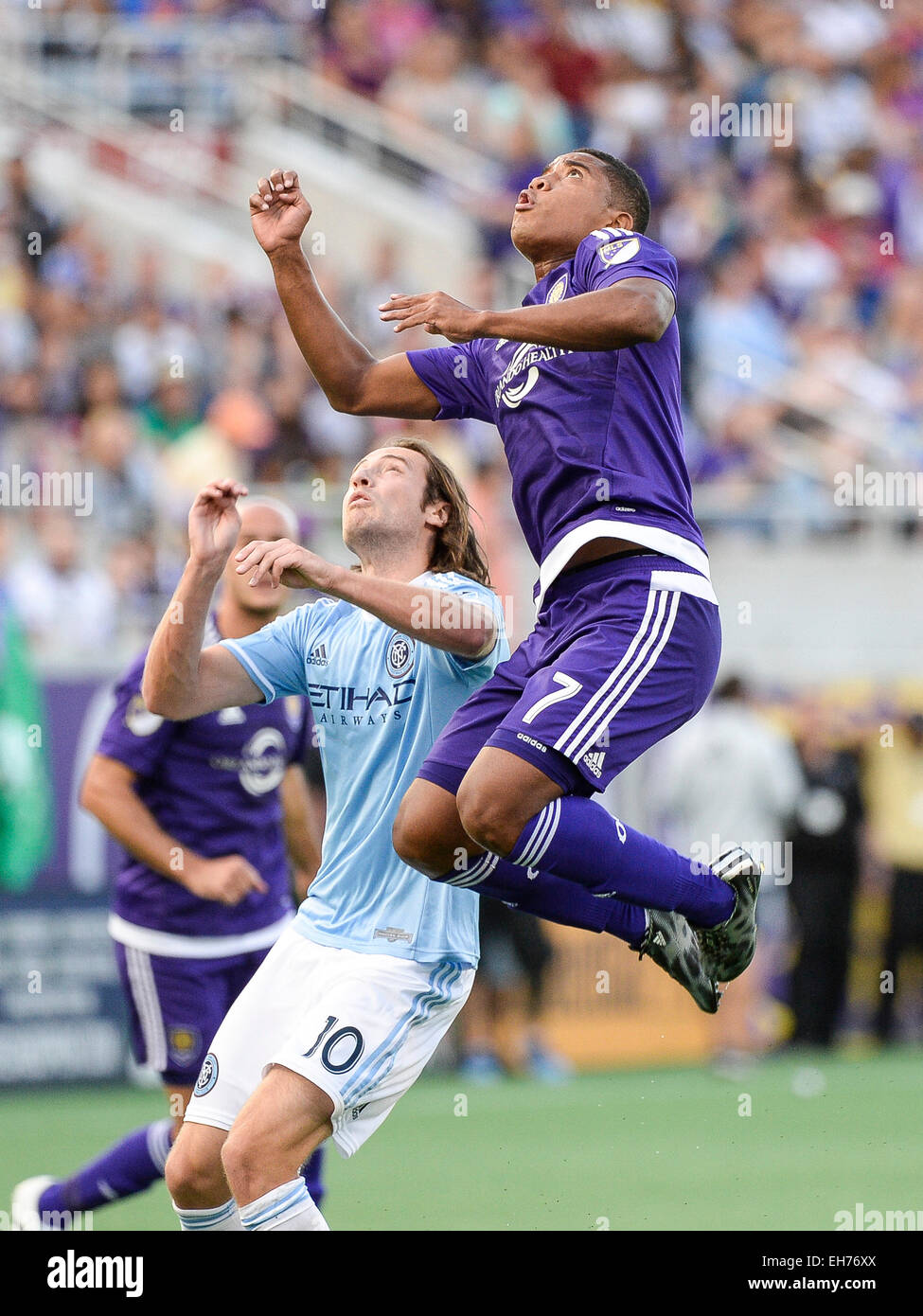 Orlando, FL, USA. 8th Mar, 2015. New York City FC midfielder Mix Diskerud (10) and Orlando City SC midfielder Cristian Higuita (7) during MLS game action between New York City FC and Orlando City SC. New York and Orlando played to a 1-1 draw at the Orlando Citrus Bowl in Orlando, Fl. Credit:  csm/Alamy Live News Stock Photo
