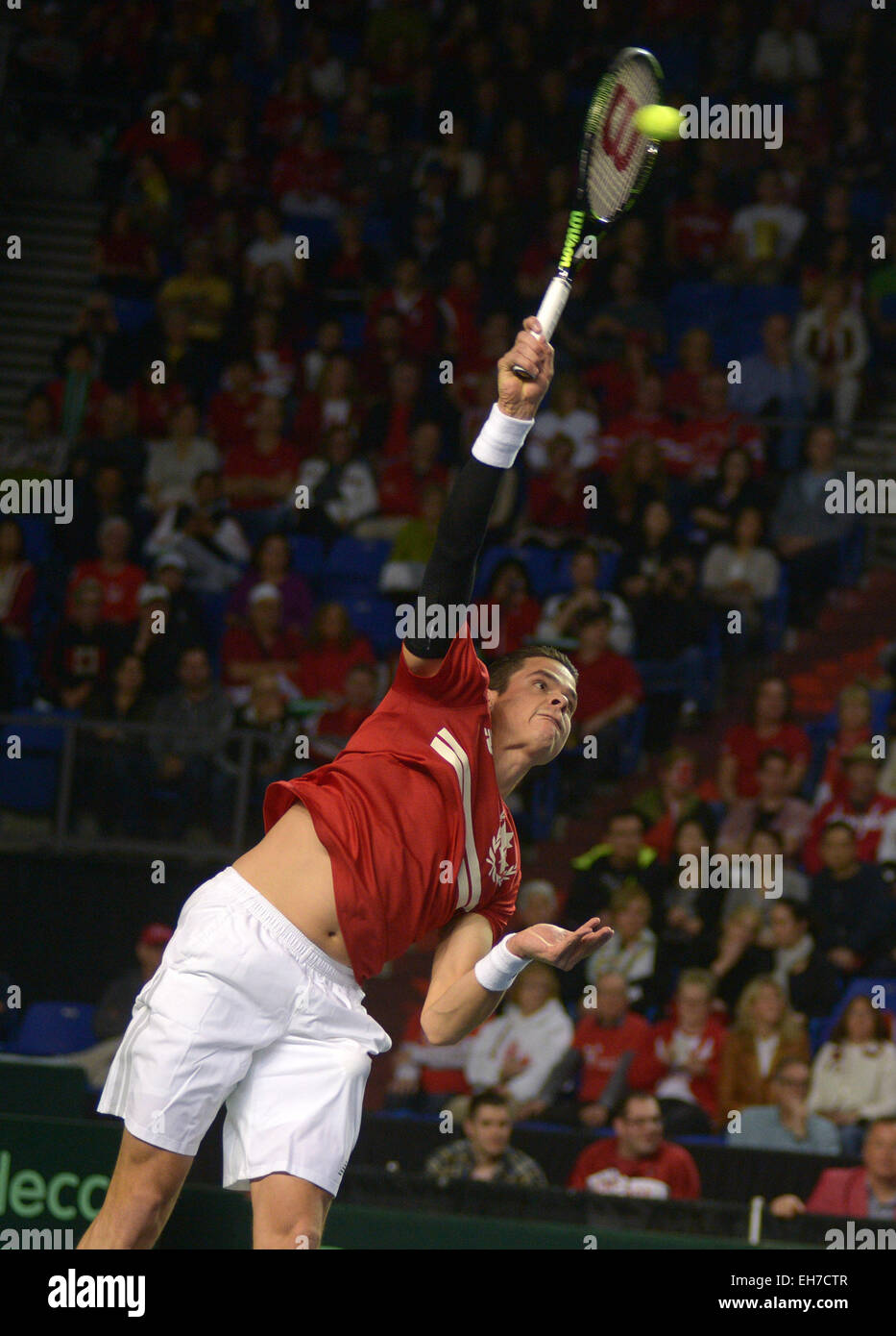 Vancouver, Canada. 8th Mar, 2015. Canada's Milos Raonic serves the ball to Japan's Kei Nishikori during their match at Davis Cup tennis tournament in Vancouver, Canada, March 8, 2015. Nishikori defeated Raonic 3-2 during final day of best-of-five World Group showdown. Credit:  Sergei Bachlakov/Xinhua/Alamy Live News Stock Photo