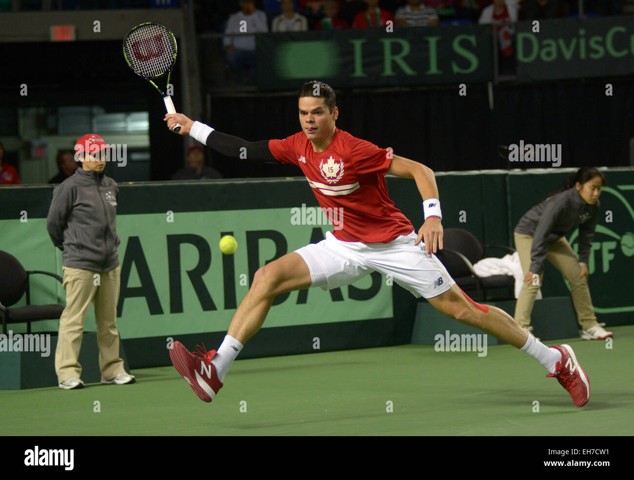 Vancouver, Canada. 8th Mar, 2015. Canada's Milos Raonic returns the ball to Japan's Kei Nishikori during their match at Davis Cup tennis tournament in Vancouver, Canada, March 8, 2015. Nishikori defeated Raonic 3-2 during final day of best-of-five World Group showdown. Credit:  Sergei Bachlakov/Xinhua/Alamy Live News Stock Photo