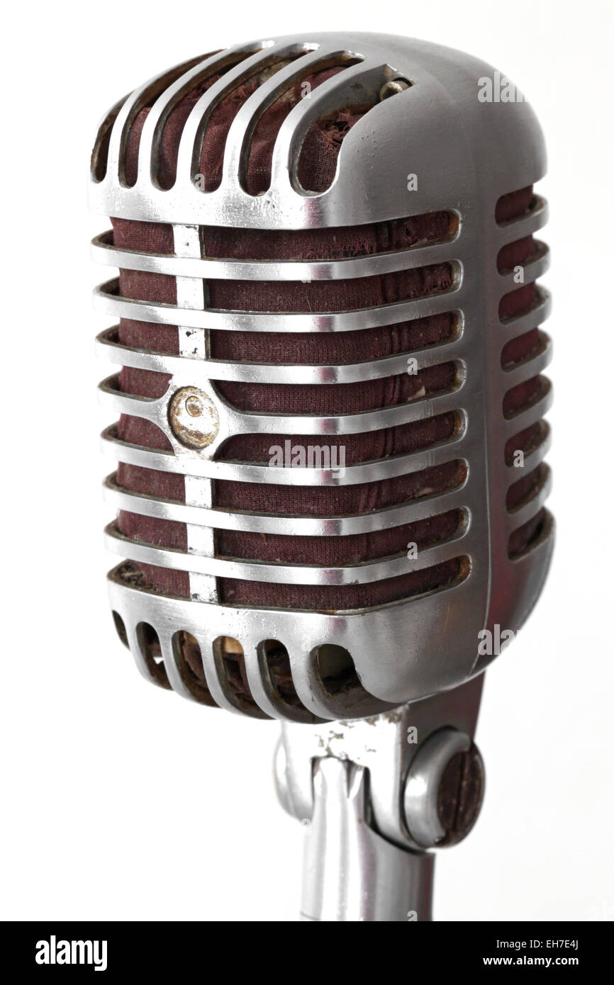 extreme closeup of vintage microphone isolated on white Stock Photo