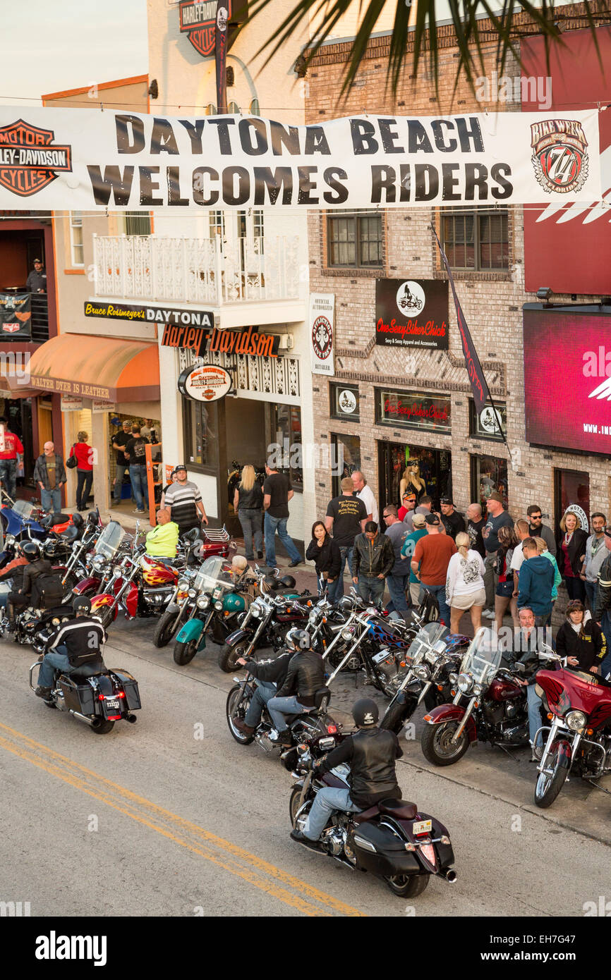 Bikers ride down Main Street during the 74th Annual Daytona Bike Week March 8, 2015 in Daytona Beach, Florida. More than 500,000 bikers and spectators gather for the week long event, the largest motorcycle rally in America. Stock Photo