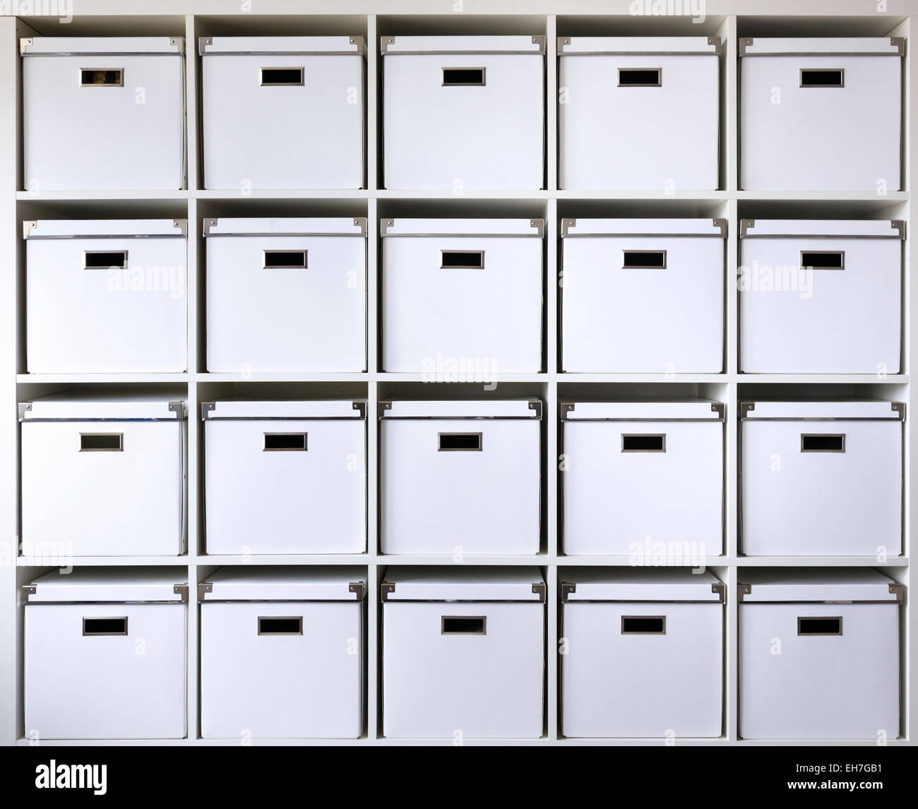 Storage boxes on shelves Stock Photo Alamy