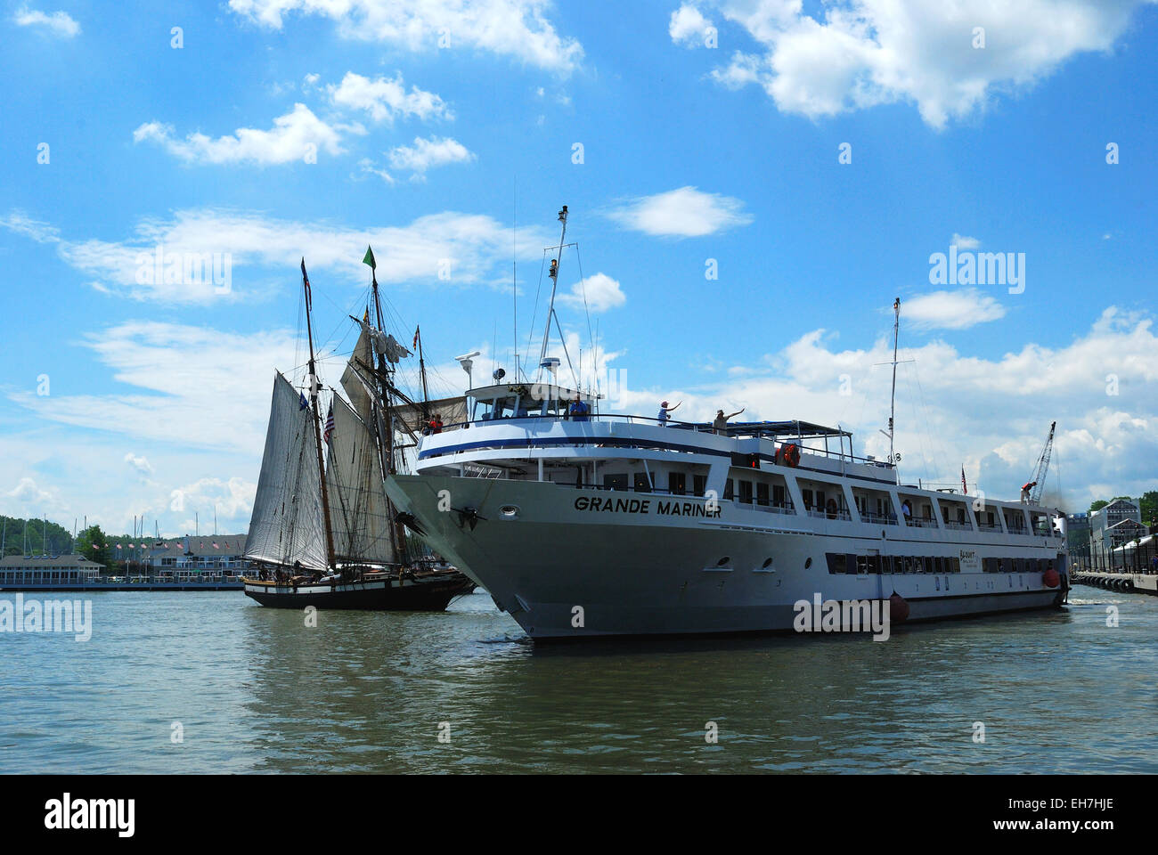 Grand Mariner Tour boat make way for Tall ship to tie up at  Rochester NY Port. Stock Photo