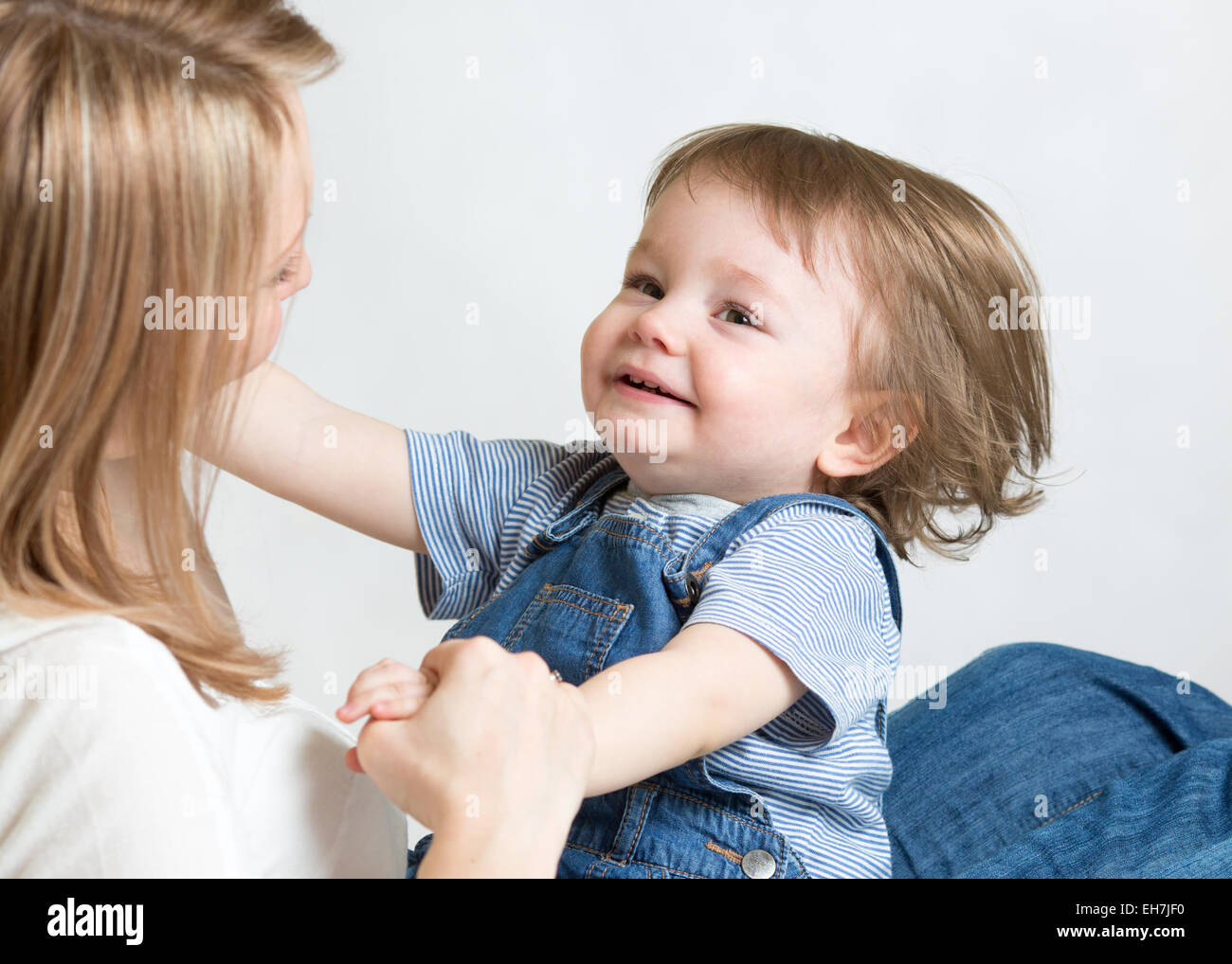 Mom and kid having fun pastime. Parenthood happiness conception. Stock Photo