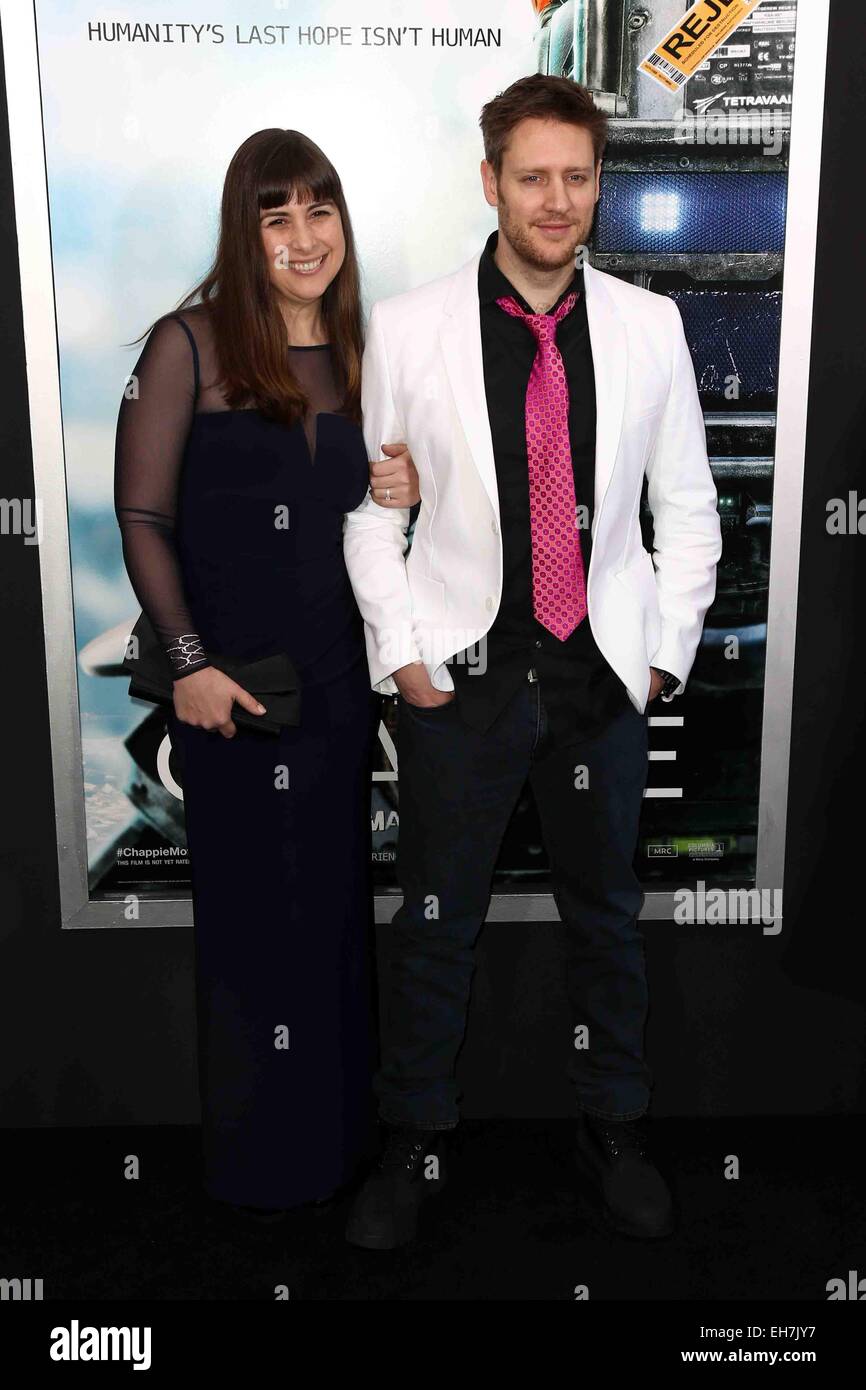 Director Neill Blomkamp (R) and writer Terri Tatchell attend the premiere of 'Chappie' at AMC Loews Lincoln Square. Stock Photo