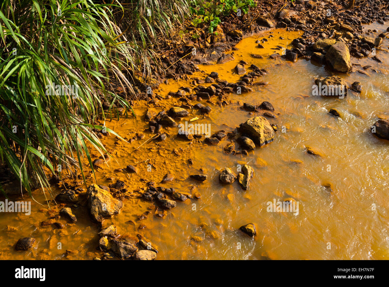 River polluted with acidic drainage water from Dabaoshan Mine, Guangdong, China Stock Photo