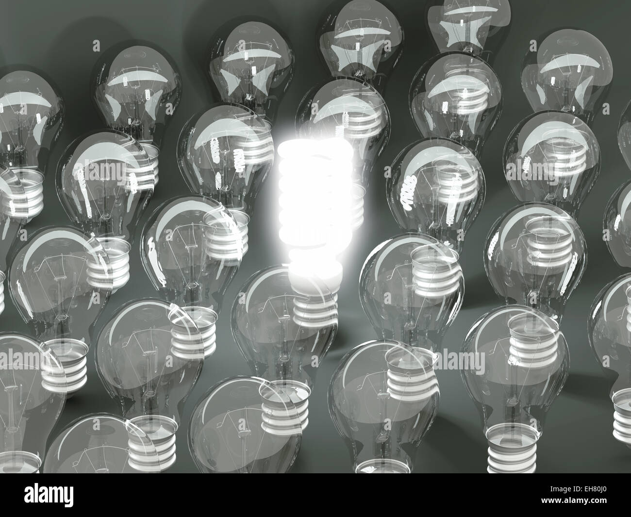 New idea or invention: illuminated efficient bulb among old ones. Large resolution Stock Photo