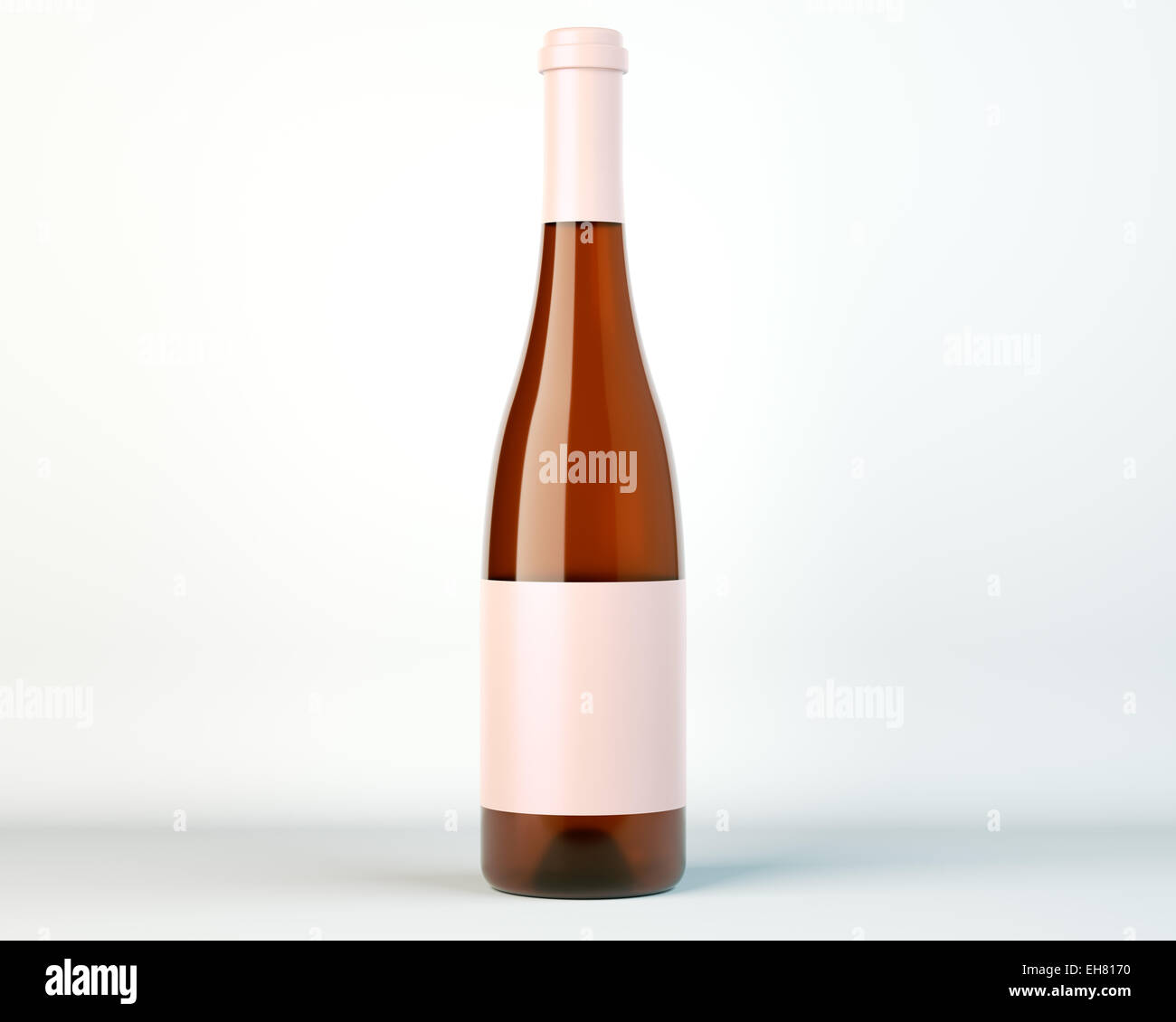 Corked bottle of white wine or brandy with blank label over studio