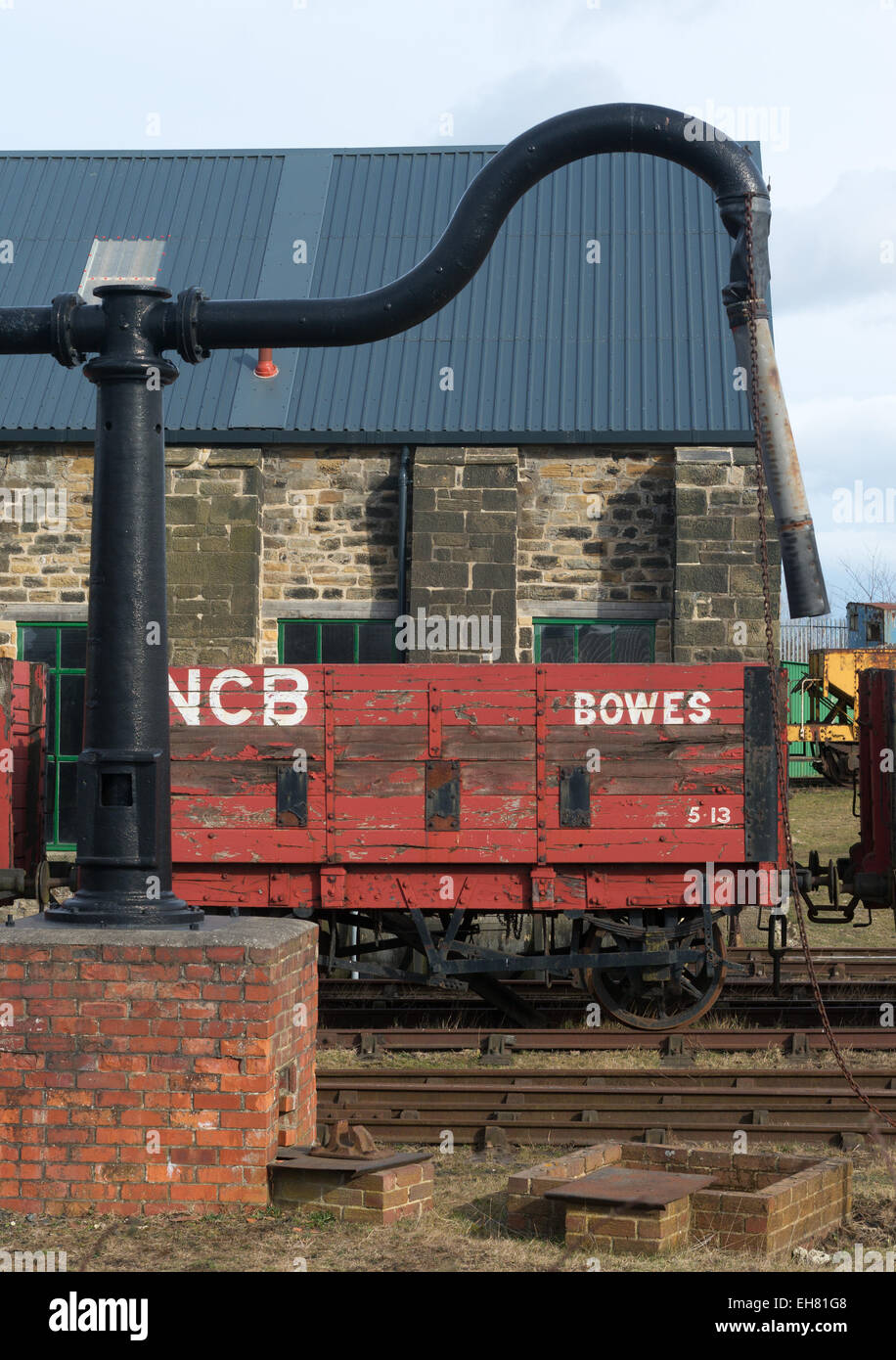 A water crane frames a NCB coal truck at the Bowes Railway, north east England, UK Stock Photo