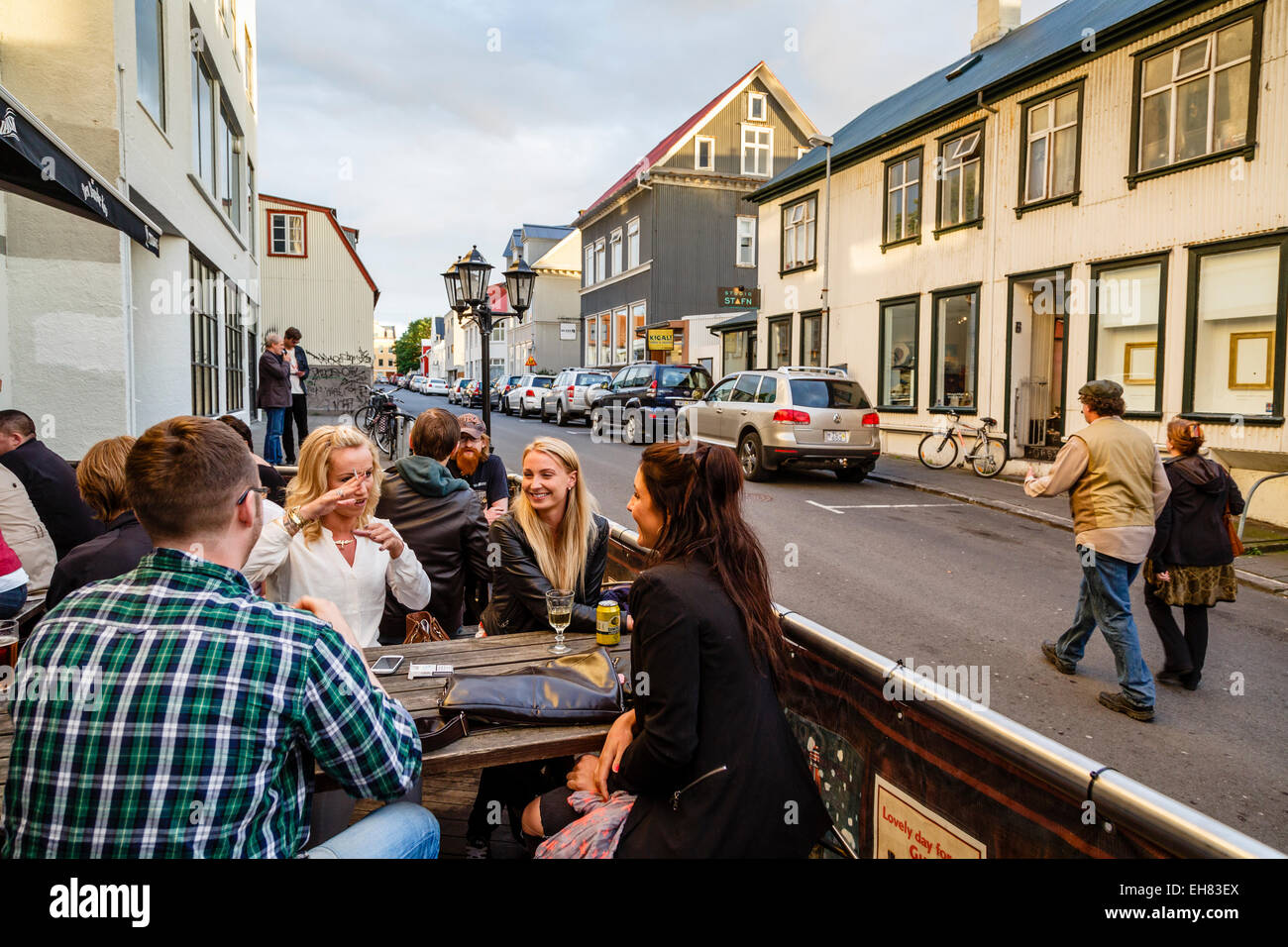 People sitting at a bar, Reykjavik, Iceland, Polar Regions Stock Photo