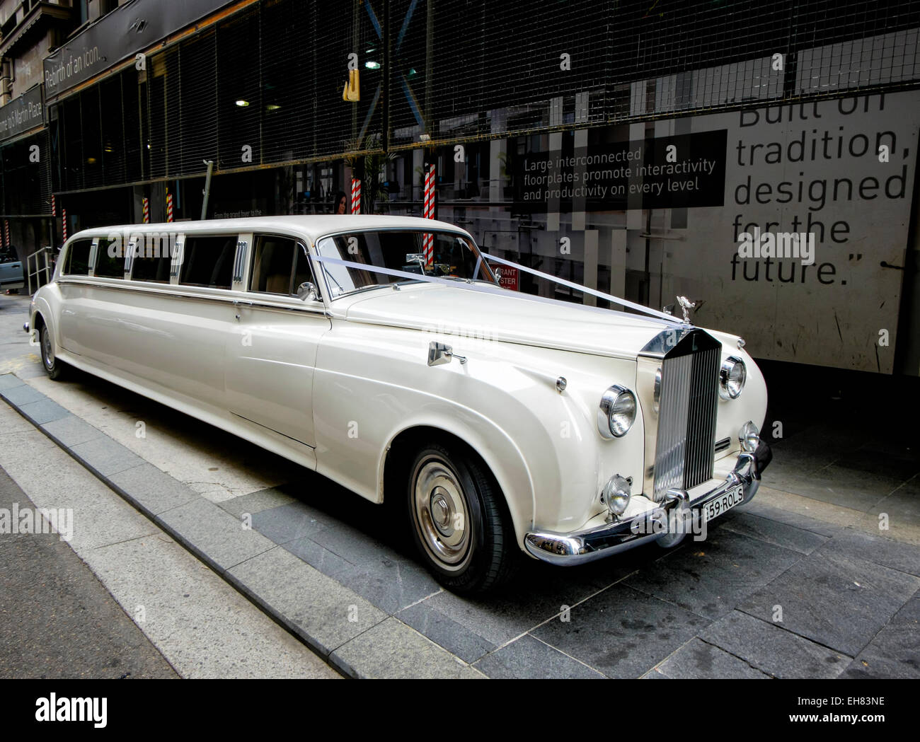 Luxury stretch limousine: A stretched Rolls Royce Phantom, used as a white wedding car; stretched limousine; modified Rolls Royce Stock Photo