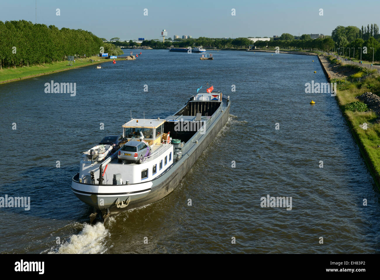 Barges on the Amsterdam-Rhine Canal, Amsterdam, North Holland, Netherlands, Europe Stock Photo