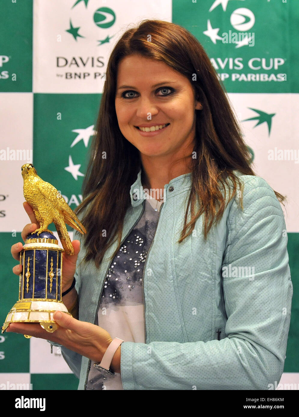 Ostrava, Czech Republic. 7th Mar, 2015. Czech tennis player Lucie Safarova pose for photo with the winner's trophy after her victory of the WTA Qatar Ladies Tennis Open in Doha, during the Davis Cup World Group first round doubles tennis match Czech Republic against Australia, in Ostrava, Czech Republic, Saturday, March 7, 2015. © Jaroslav Ozana/CTK Photo/Alamy Live News Stock Photo