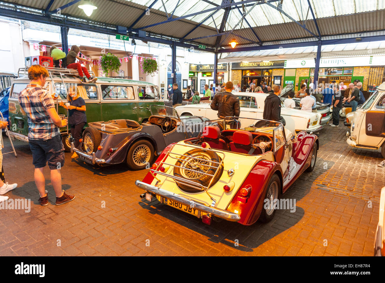 Classic cars lined up in Greenwich market for the monthly Park in the Market meetup. Stock Photo