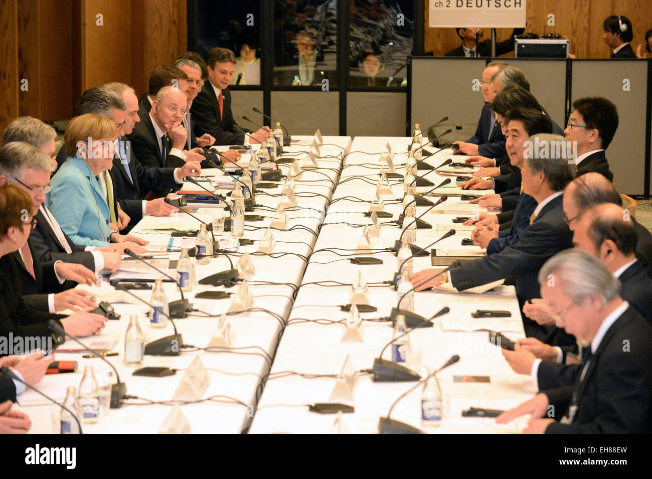 Tokyo, Japan. 9th Mar, 2015. Germany's Chancellor Angela Merkel (4th L) and Japan's Prime Minister Shinzo Abe (5th R) take part in a meeting with German and Japanese business leaders in Tokyo, Japan, March 9, 2015. © Ma Ping/Xinhua/Alamy Live News Stock Photo