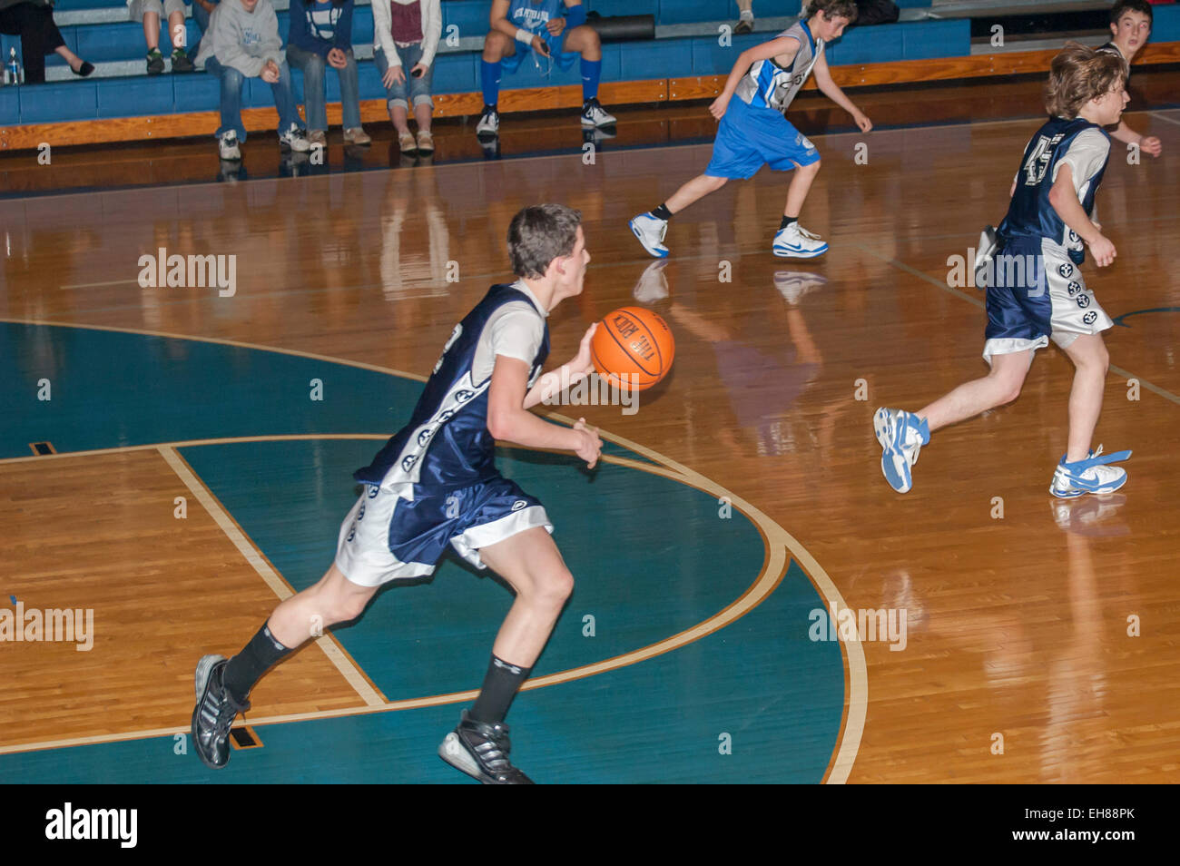 American middle school boys playing basketball Stock Photo Alamy