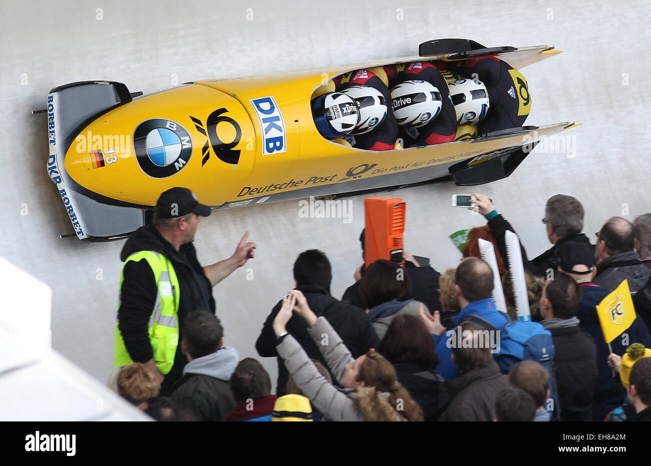 Winterberg, Germany. 08th Mar, 2015. Bobsleigh pilot Francesco Friedrich and his pushers Candy Bauer, Martin Grothkopp and Thorsten Margis of the Germany in action during the Bobsleigh and Skeleton World Championships 2015 in Winterberg, Germany, 08 March 2015. Photo: Ina Fassbender/dpa/Alamy Live News Stock Photo