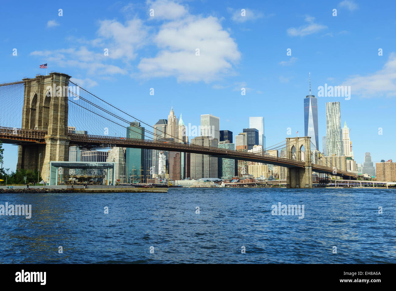 Brooklyn Bridge and Lower Manhattan skyscrapers including One World Trade Center, New York City, New York, USA Stock Photo