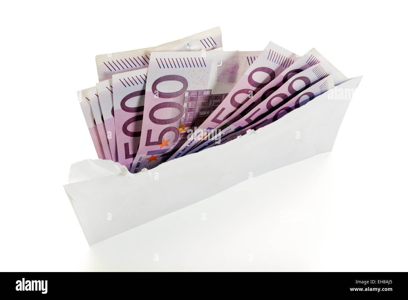 Black money - ten five hundred euro bills in envelope, torn open Stock Photo