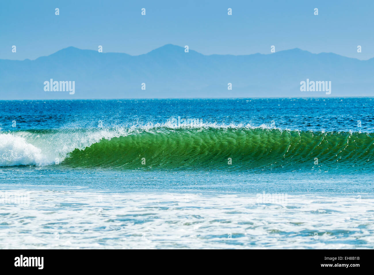 Classic curling shore break surf wave, typical of this coast, Playa Hermosa, San Juan del Sur, Rivas Province, Nicaragua Stock Photo