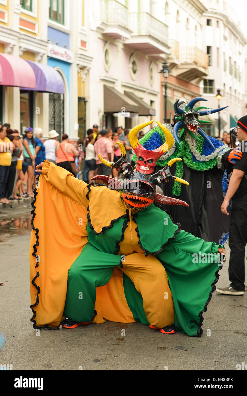 Vejigante posing during the carnival parade in Ponce, Puerto Rico. February, 2015. Stock Photo