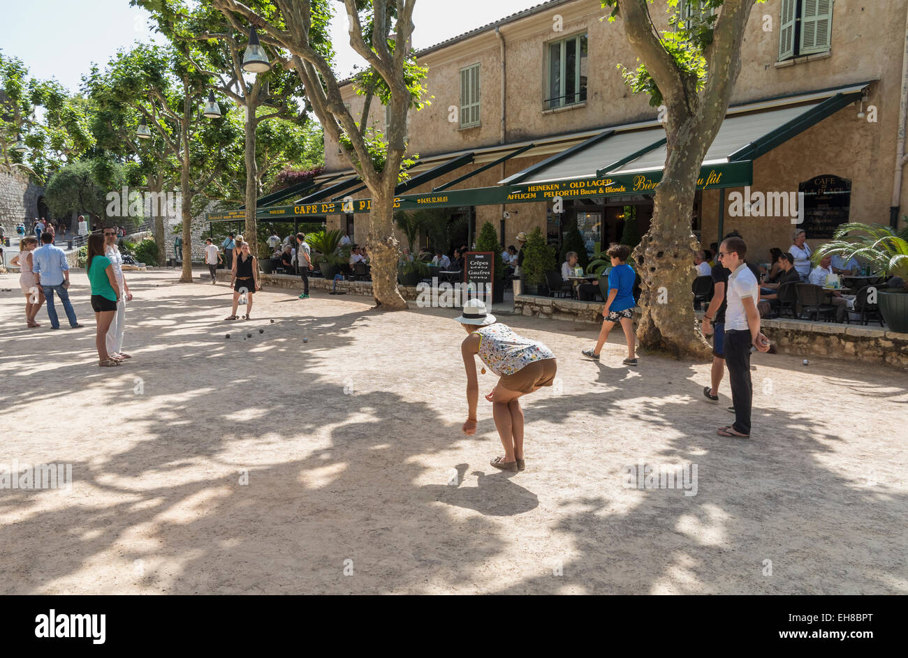 People playing boules / petanque outside a cafe in Saint-Paul-de-Vence, Alpes-Maritimes, Provence, France, Europe Stock Photo